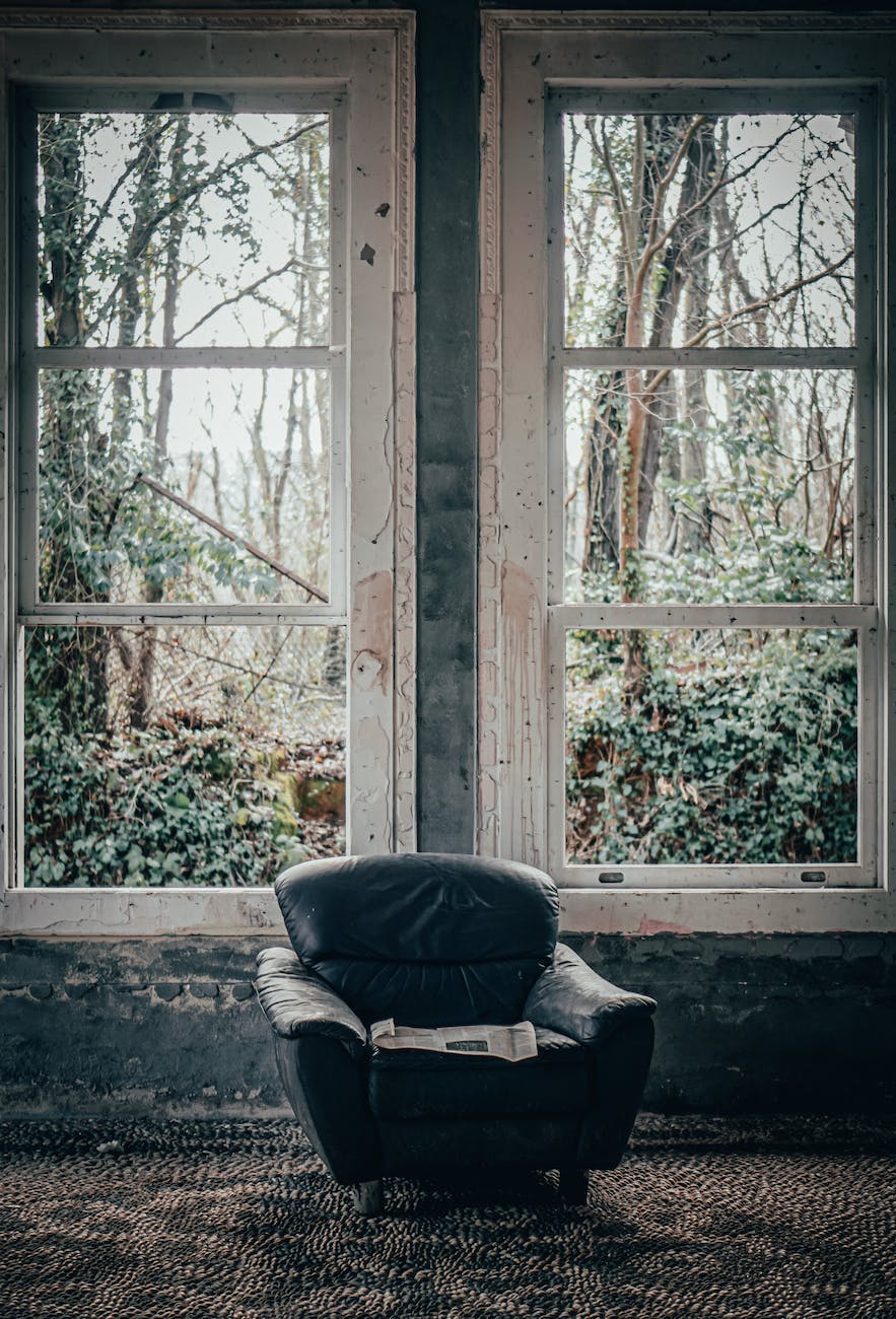 photo of chair near windows